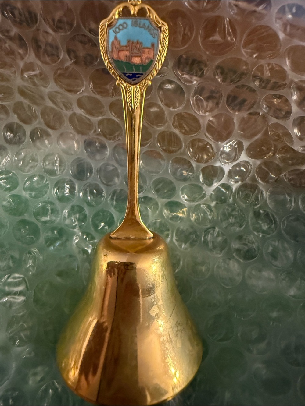 Gold Decorative Souvenir Bell with Blue Enamel Crest 1000 Islands